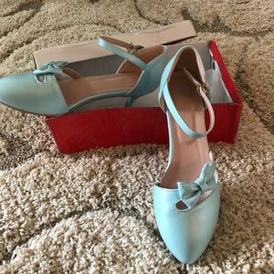 Beautiful light blue kitten heel pumps